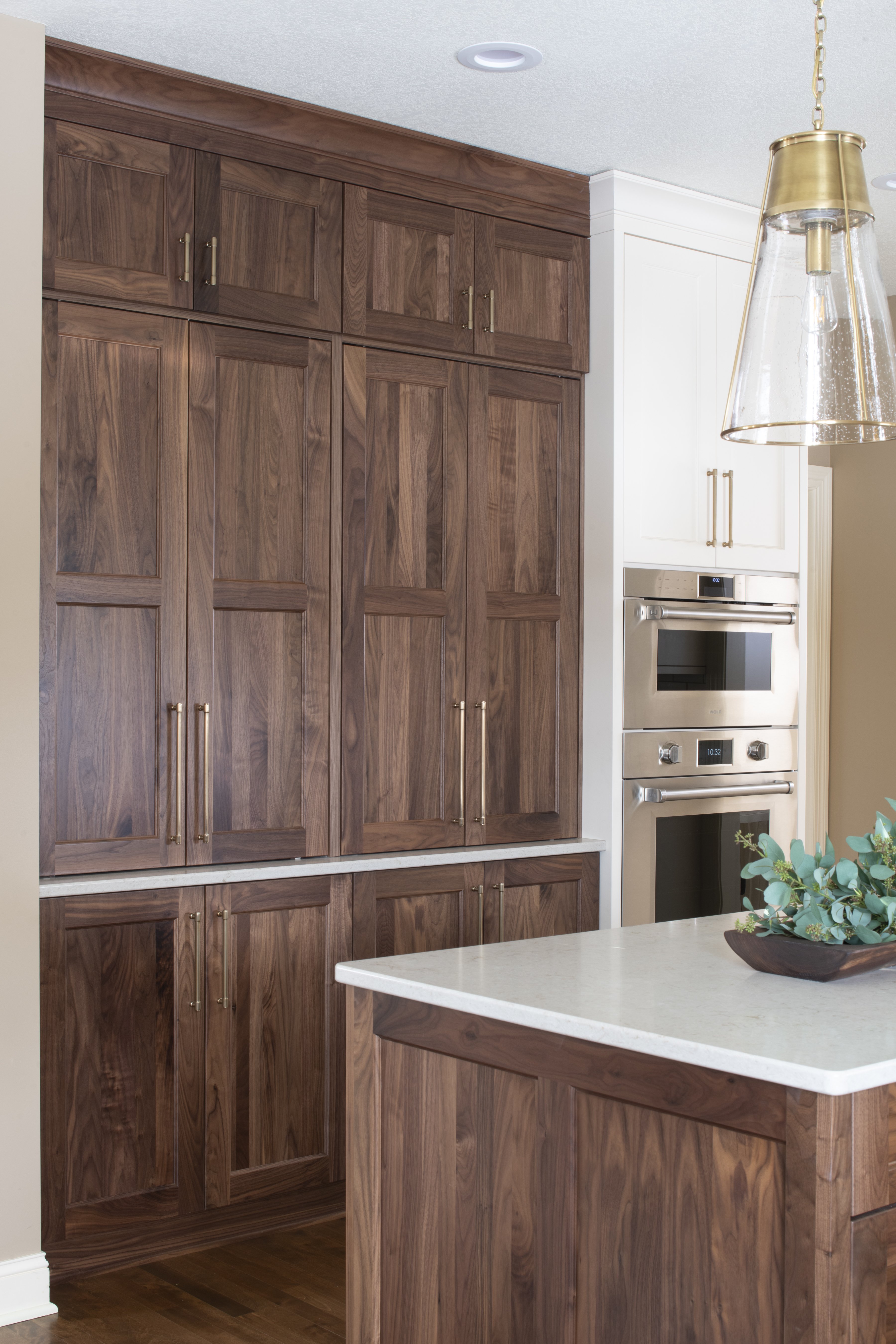 Walnut Cabinetry for Storage in Kitchen